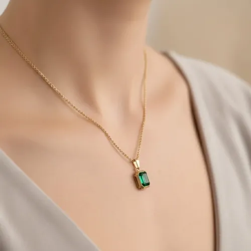 How to pair emerald rings with winter coats and scarves